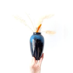 Blue and black ceramic vase.